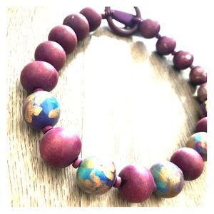 Gorgeous wood hand painted necklace.